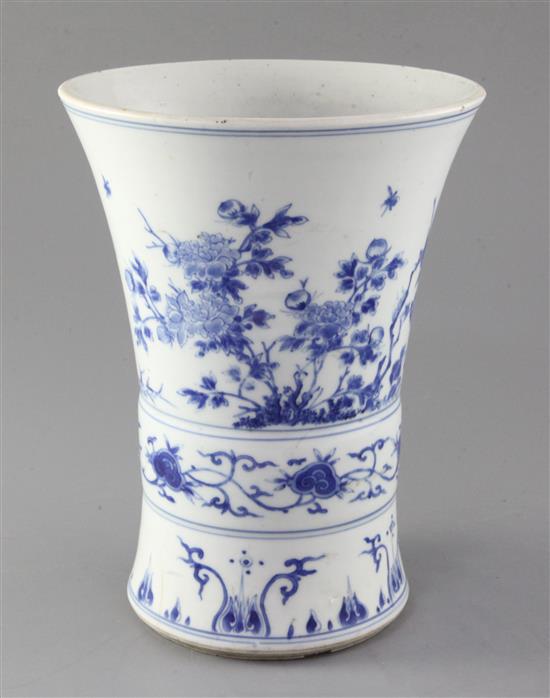 A Chinese blue and white gu-shaped vase or brush pot, Transitional period, mid 17th century, height 24.5cm, diameter 18.5cm, firing cra